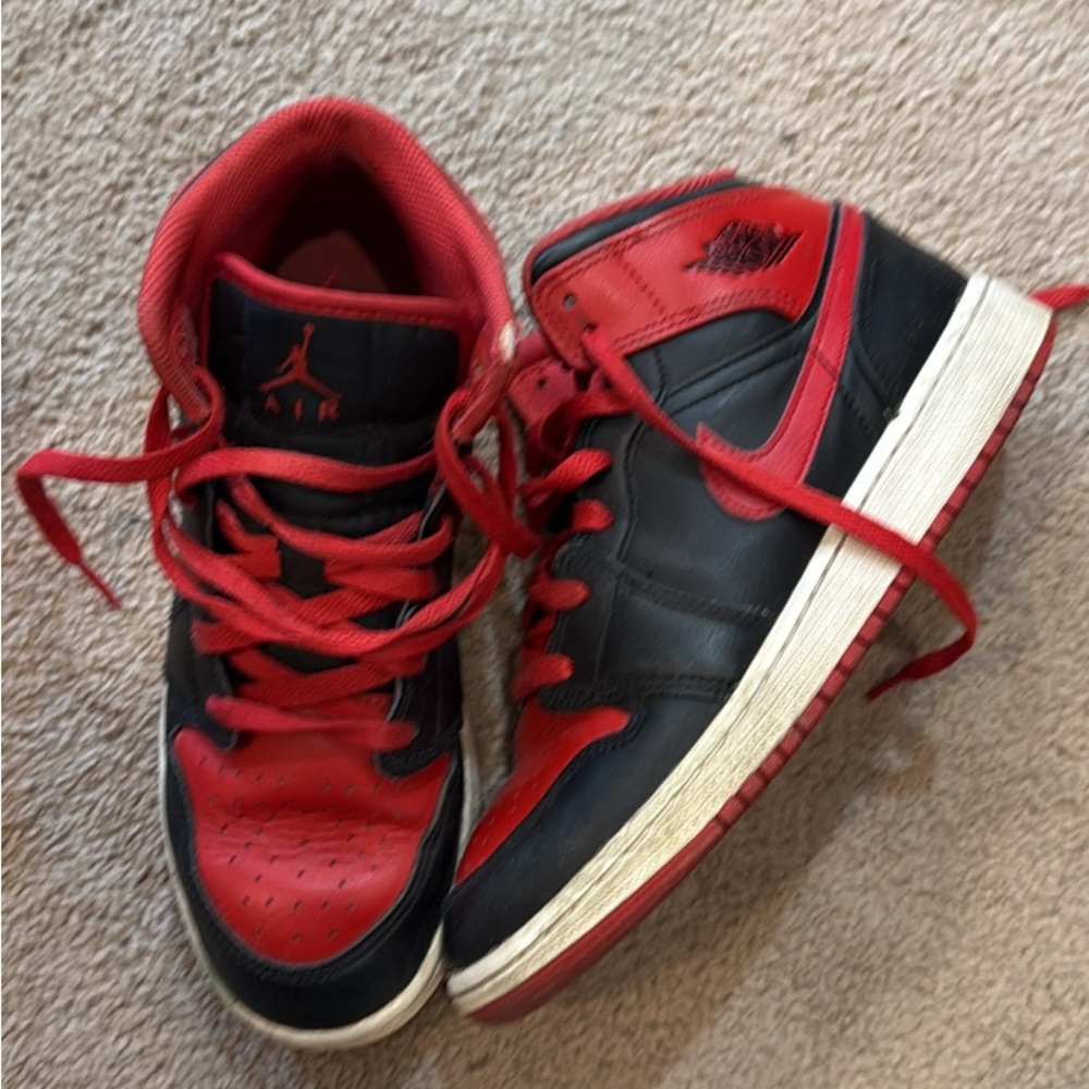 Air Jordan Black and Red Sneakers